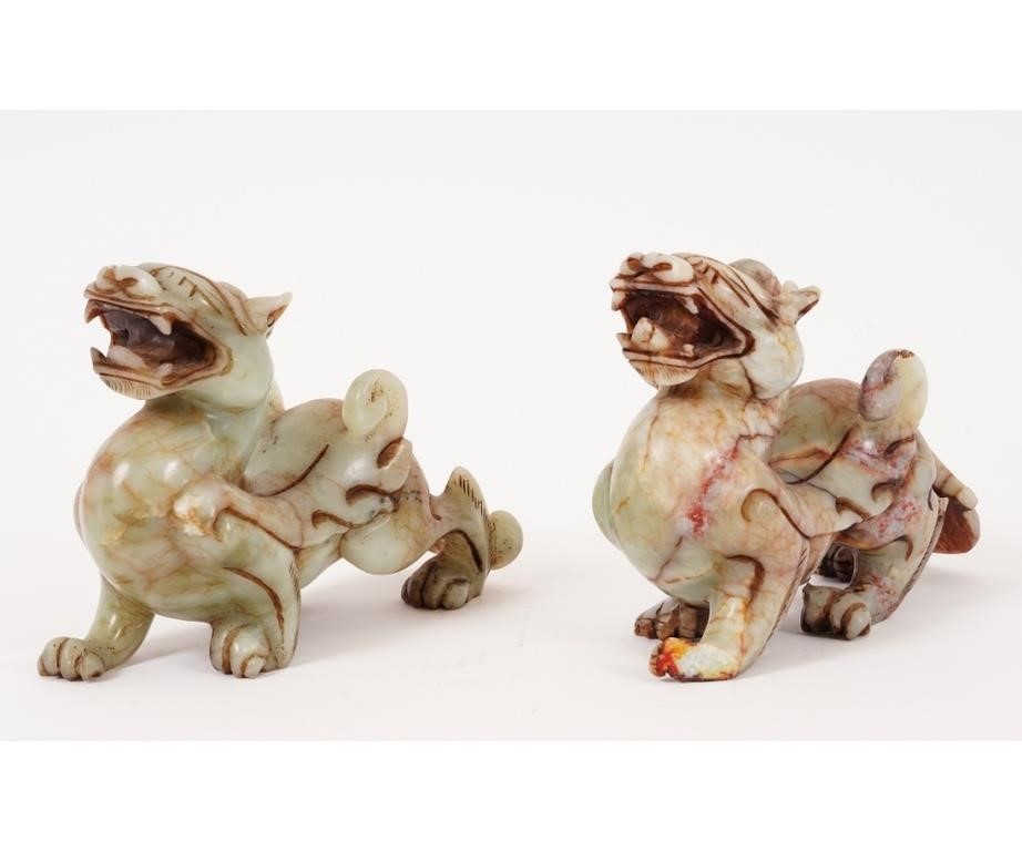Pair of carved jade Foo dogs,