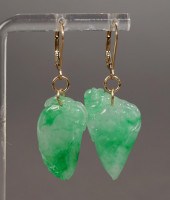 PAIR OF CARVED JADE PIERCED PE