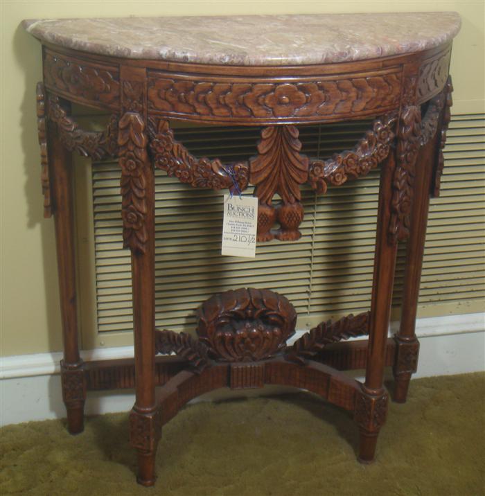 Pair of carved mahogany continental