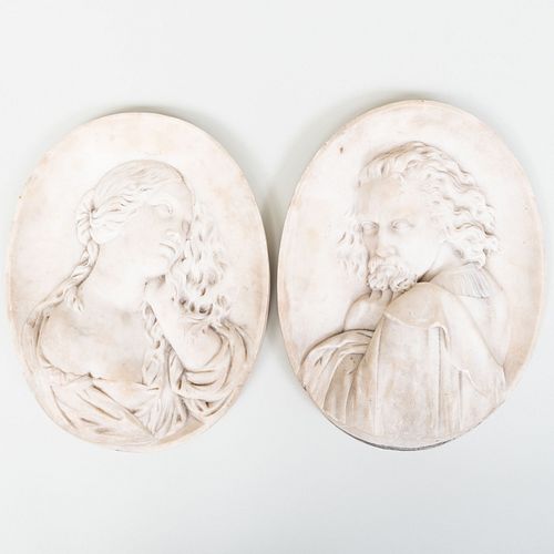 PAIR OF CARVED MARBLE PROFILE