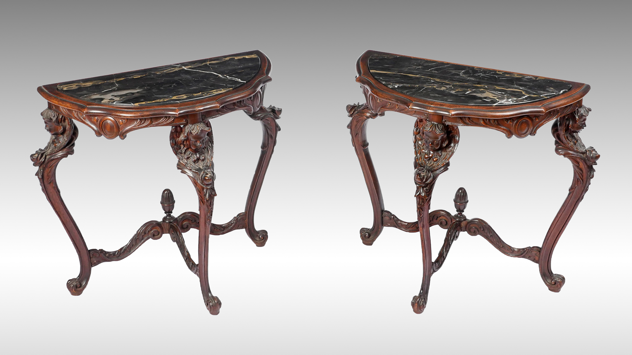 PAIR OF CARVED MARBLE TOP FIGURAL