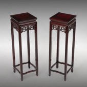 PAIR OF CARVED ROSEWOOD CHINES