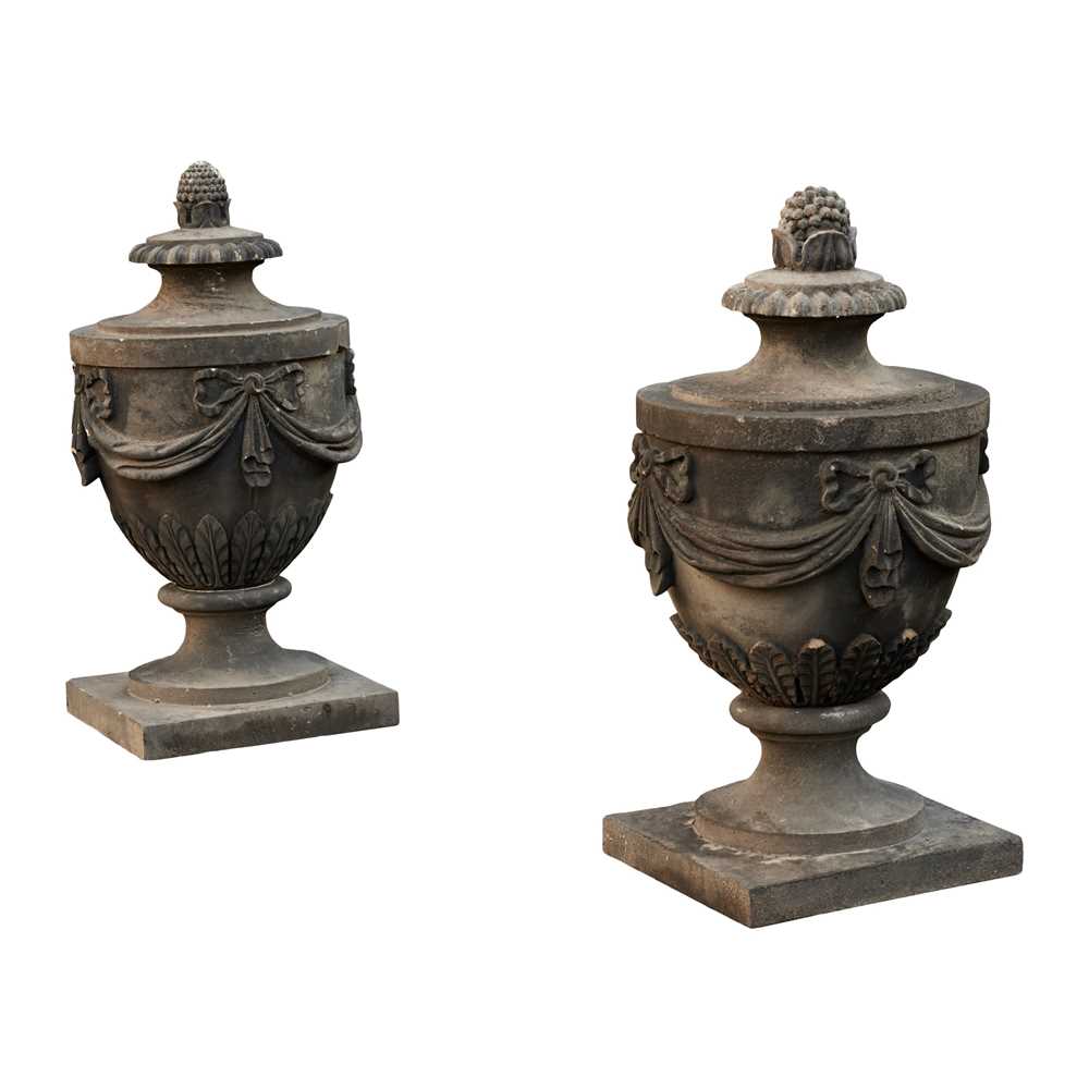 PAIR OF CARVED SANDSTONE ADAM STYLE