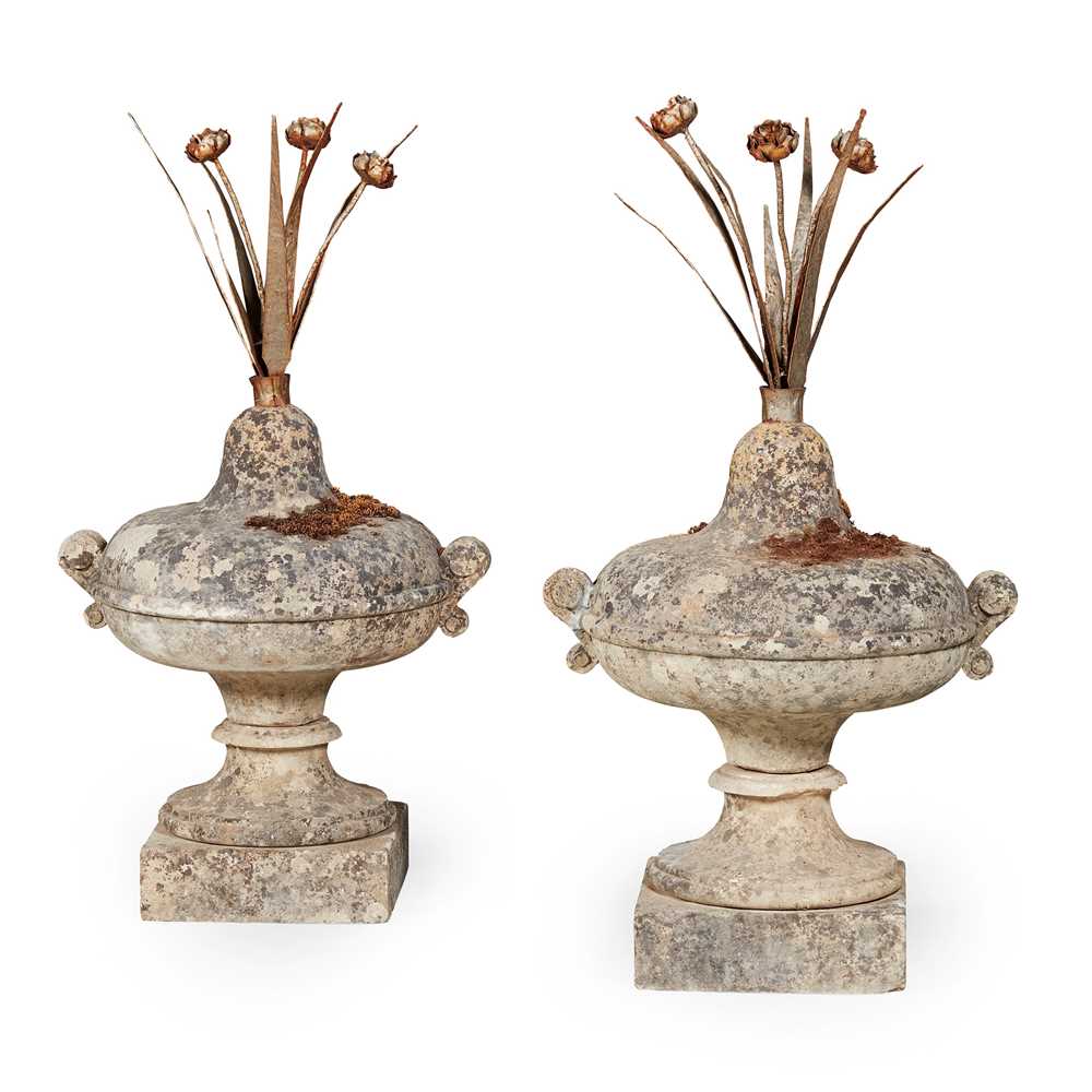 PAIR OF CARVED STONE AND TOLE