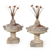 PAIR OF CARVED STONE AND TOLE