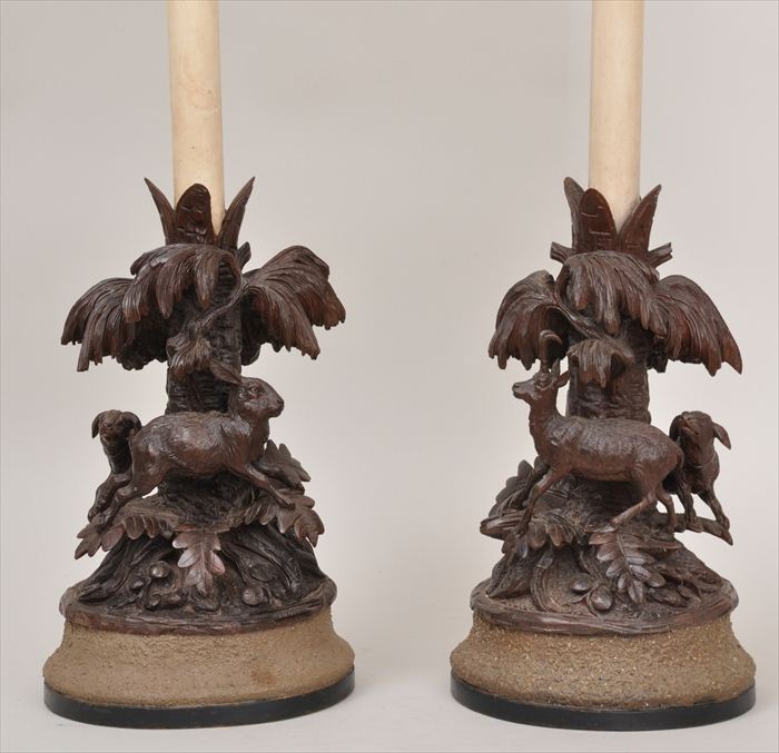 PAIR OF CARVED WALNUT ANIMALIER