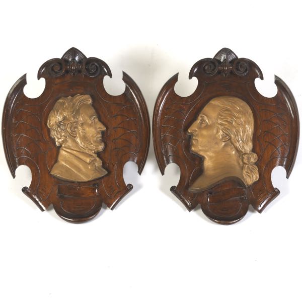 PAIR OF CARVED WOOD PRESIDENTIAL