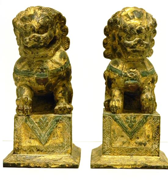 Pair of carved wooden Foo lions 