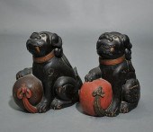 PAIR OF CARVED WOODEN FOO DOGS