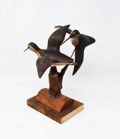 PAIR OF CARVED WOODEN SHORE BI
