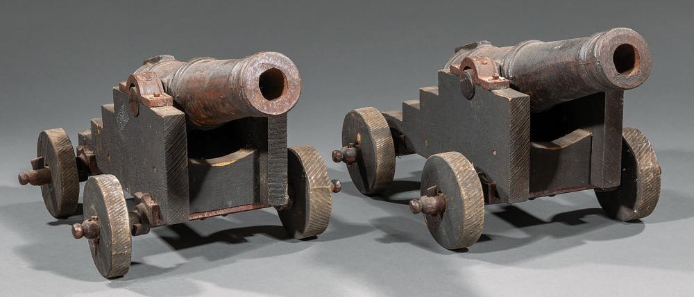 PAIR OF CAST IRON AND WOOD
