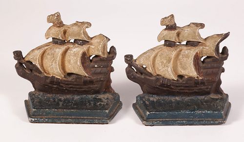 PAIR OF CAST IRON AND PAINTED