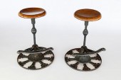 PAIR OF CAST IRON AND WALNUT S