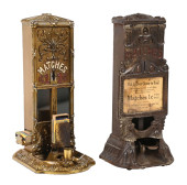 PAIR OF CAST IRON BOXED MATCH