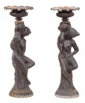 PAIR OF CAST IRON FIGURAL GARD