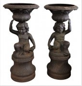 PAIR OF CAST IRON FIGURAL TWO