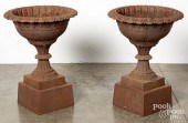 PAIR OF CAST IRON GARDEN URNS,