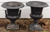 PAIR OF CAST IRON GARDEN URNS