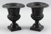 PAIR OF CAST IRON GARDEN URNS
