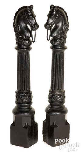 PAIR OF CAST IRON HORSE HEAD