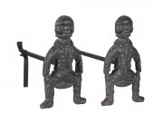 PAIR OF CAST IRON "JOLLY FELLO