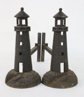 PAIR OF CAST IRON LIGHTHOUSE A