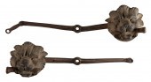PAIR OF CAST IRON LION’S-MASK