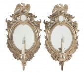 PAIR OF CAST IRON MIRROR-BACK