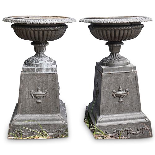 PAIR OF CAST IRON PEDESTAL