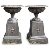 PAIR OF CAST IRON PEDESTAL URN