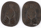 PAIR OF CAST IRON PINEAPPLE CO