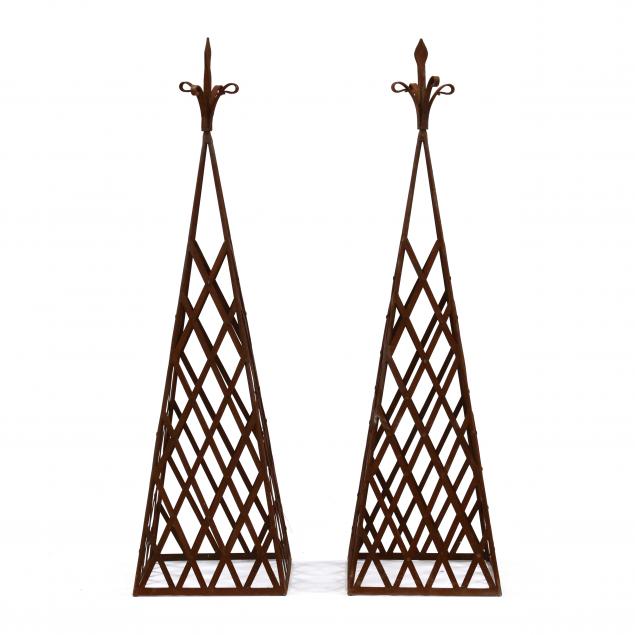 PAIR OF CAST IRON PYRAMID FORM