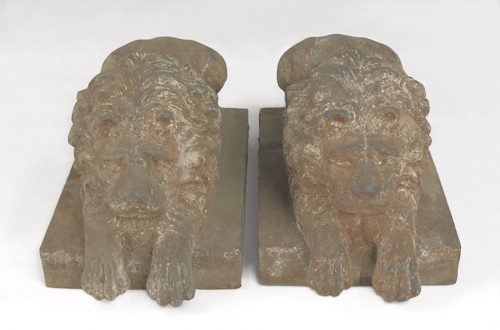 Pair of cast iron recumbent lion