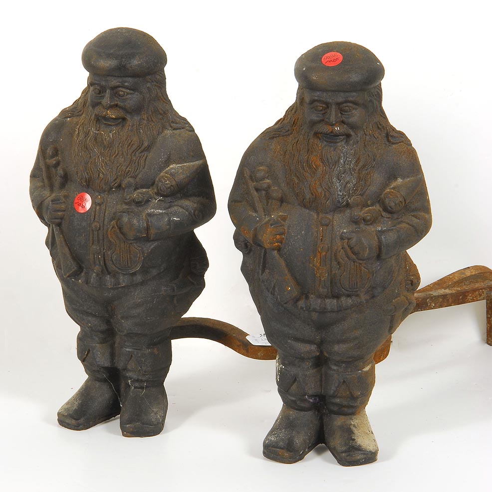 PAIR OF CAST IRON SANTA CLAUS