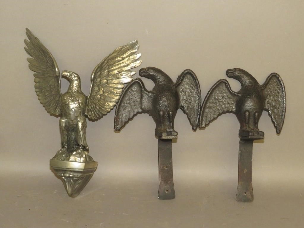 PAIR OF CAST IRON SNOW EAGLES &