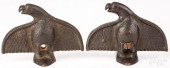 PAIR OF CAST IRON SPREAD WING