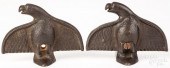 PAIR OF CAST IRON SPREAD WING