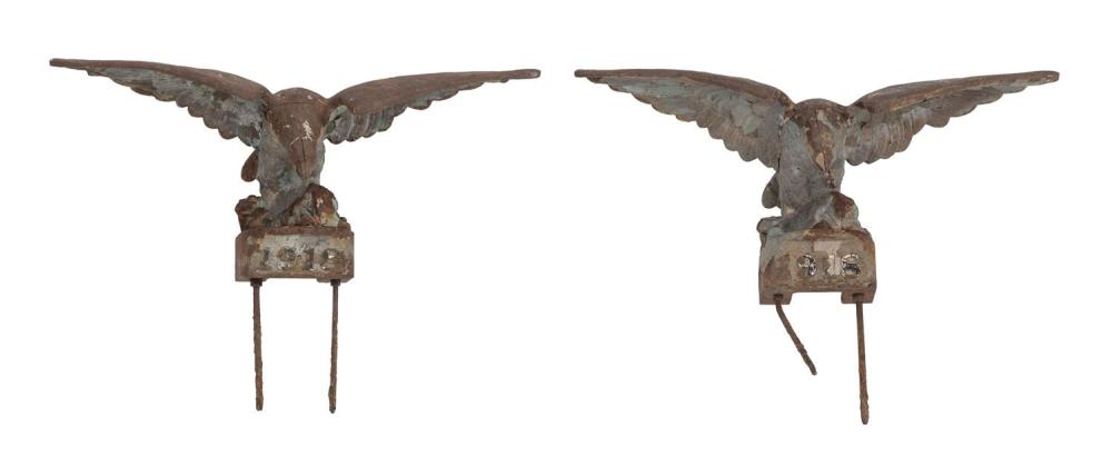 PAIR OF CAST IRON SPREAD-WING