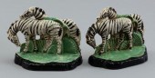 PAIR OF CAST IRON ZEBRA BOOKEN