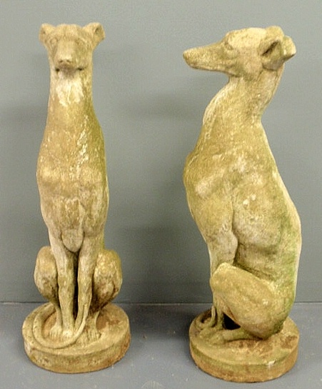 Pair of cast stone seated whippet