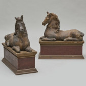 PAIR OF CAST STONE SEATED HORS