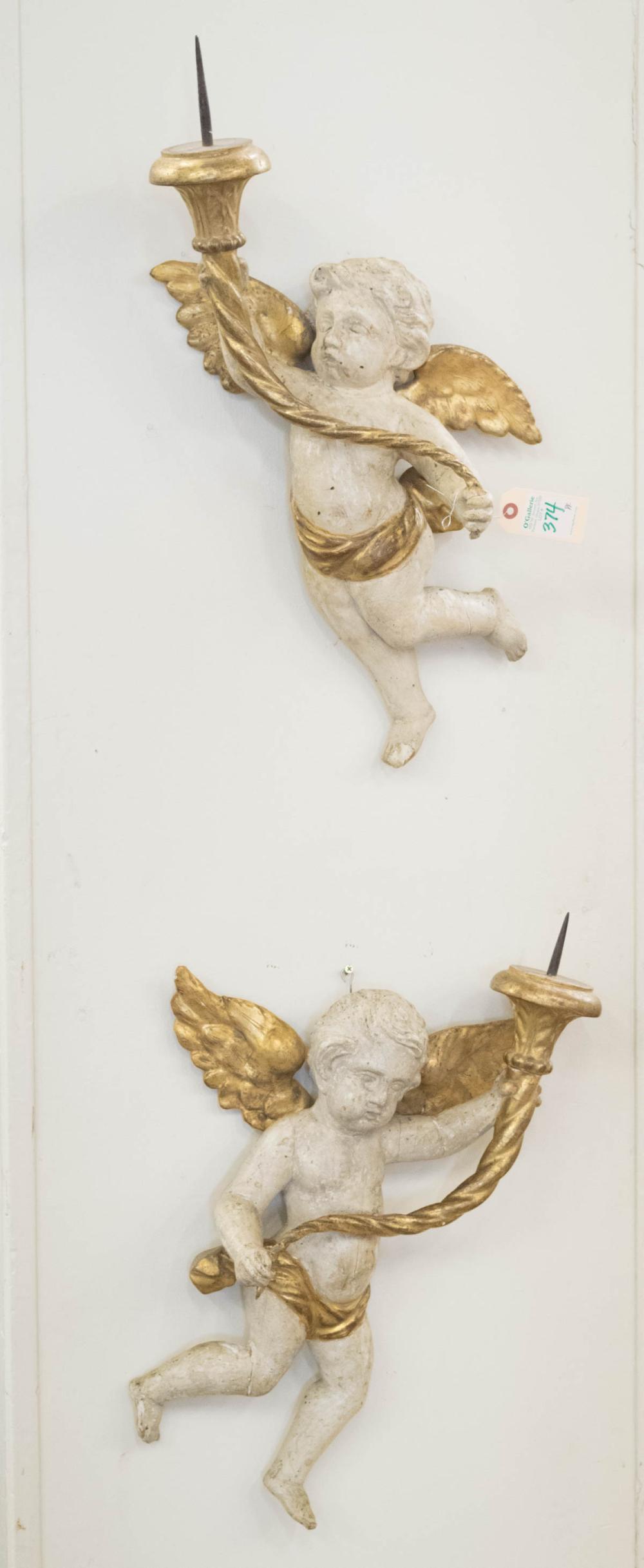 PAIR OF CHERUB PRICKET WALL