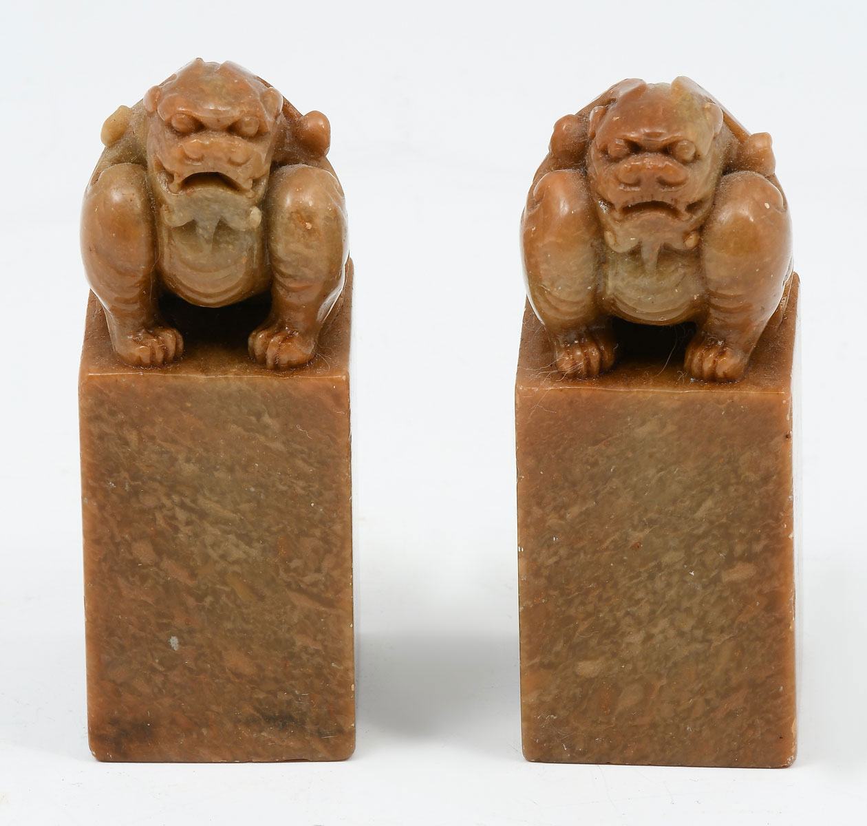 PAIR OF CHINESE CARVED ARCHAIC