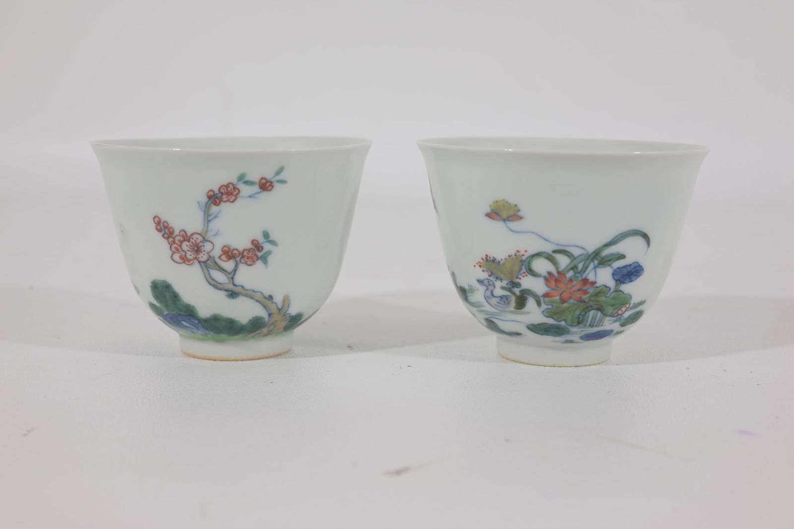 PAIR OF CHINESE DOUCAI CUPS WITH