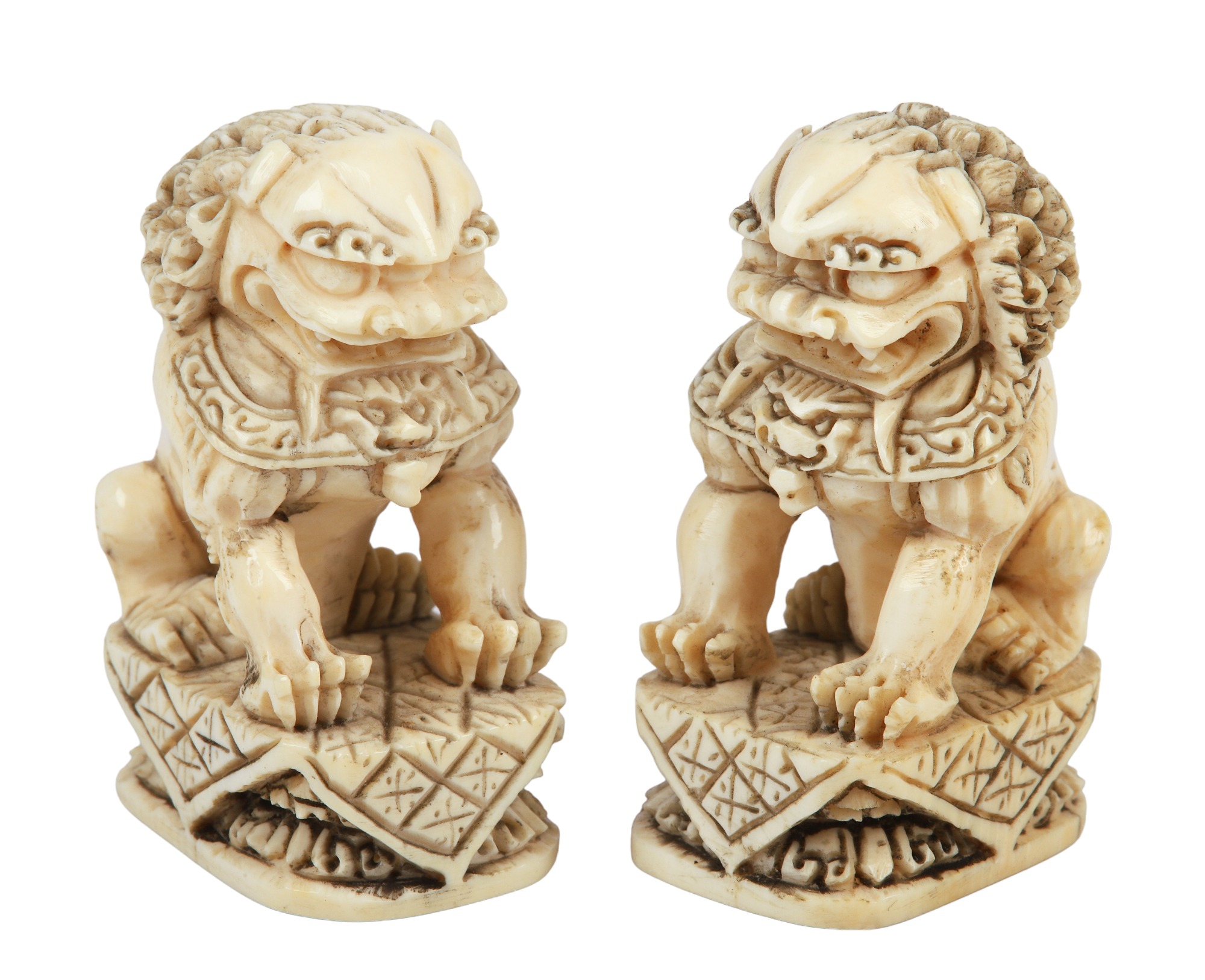 Pair of Chinese ivory foo lion