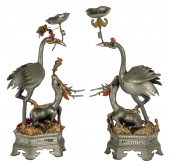 PAIR OF CHINESE METAL CANDLEST