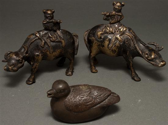 Pair of Chinese patinated brass