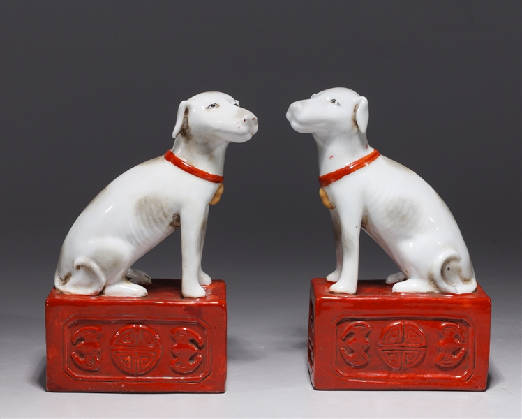 Pair of Chinese porcelain dogs, one