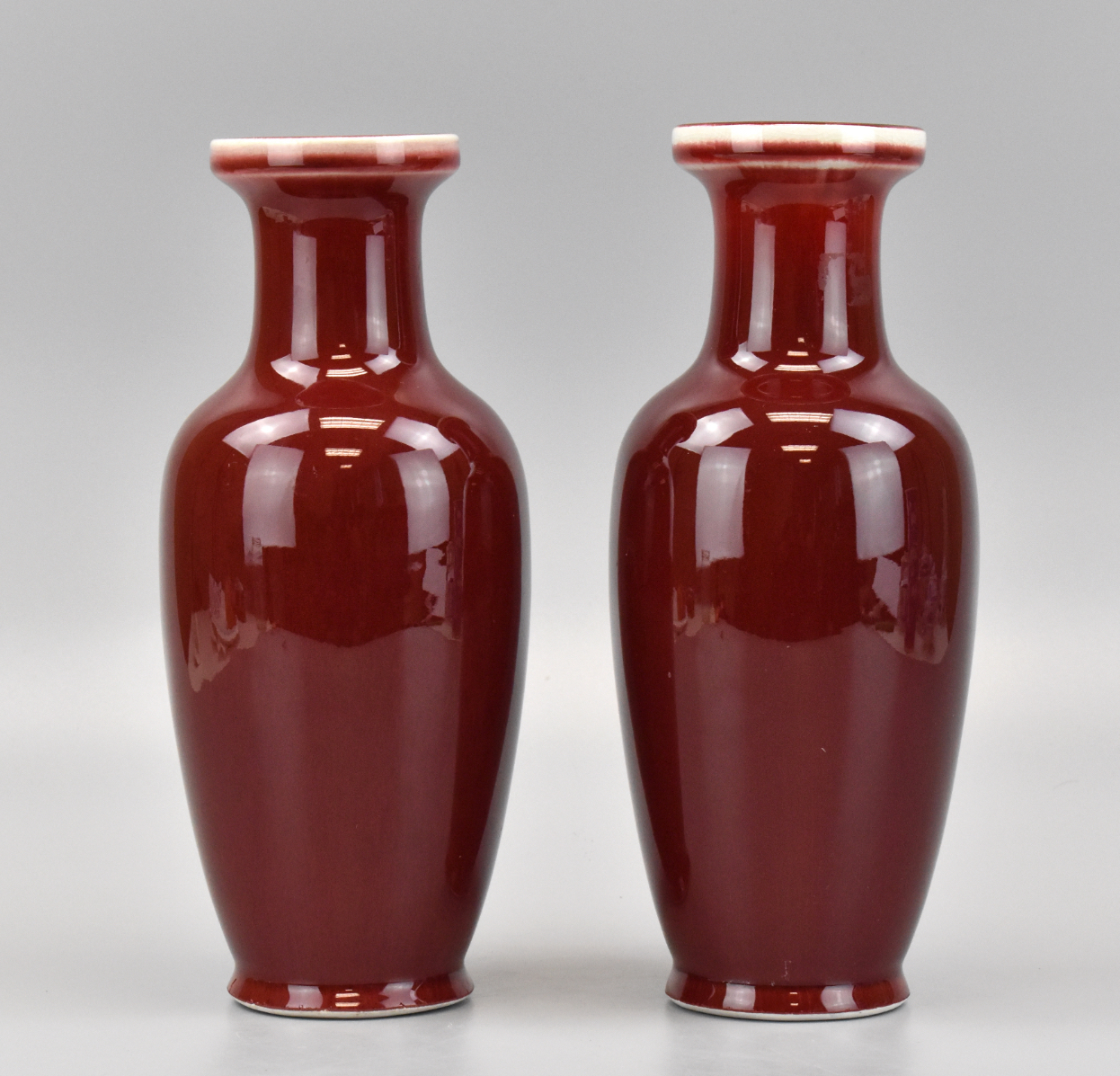 PAIR OF CHINESE RED GLAZED VASES,