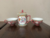 PAIR OF CHINESE TEA CUPS AND T